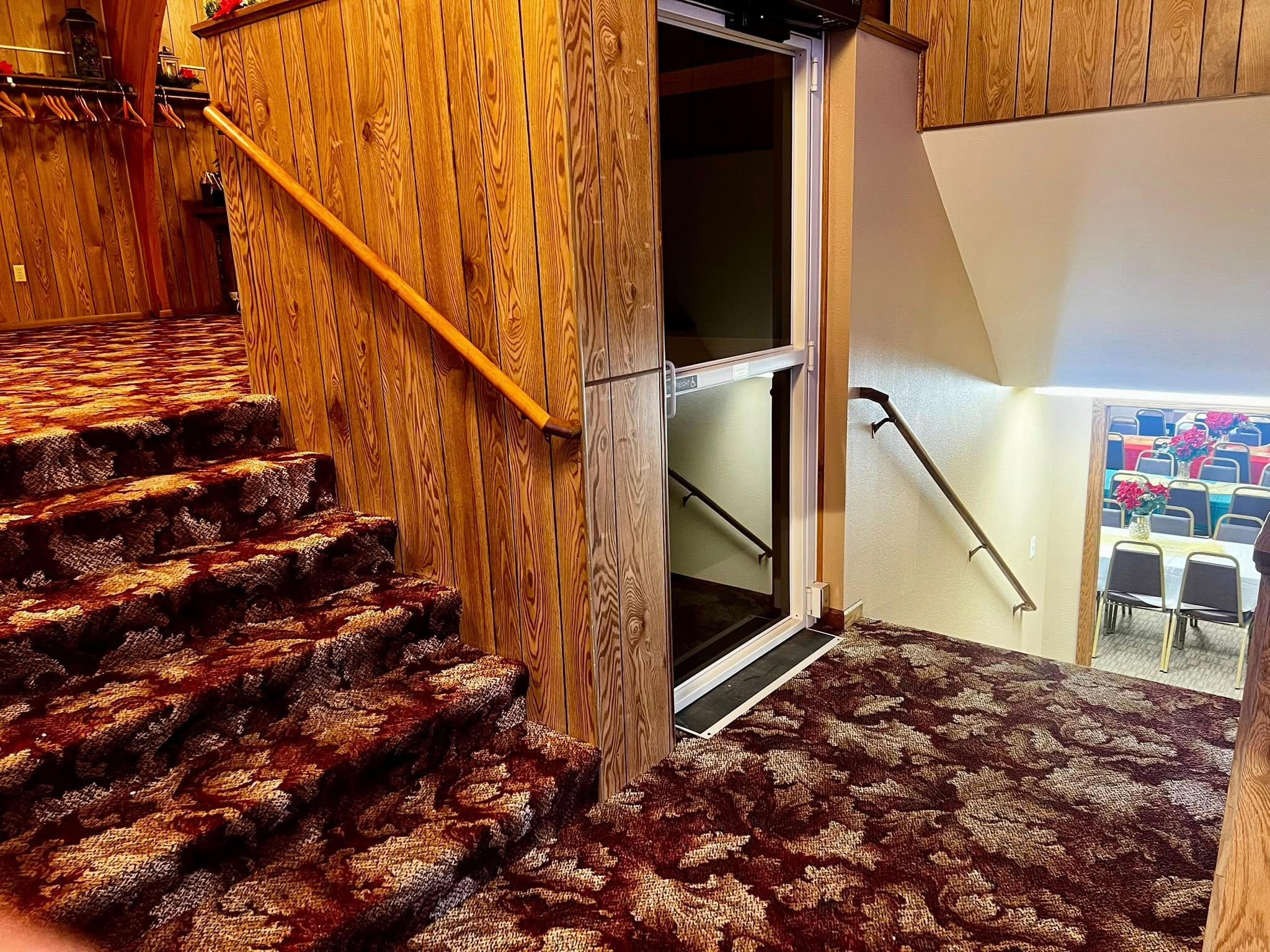 Upstairs to vestibule or down to fellowship hall Stairs to go up to the sanctuary or down to the fellowship hall. Elevator available